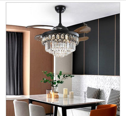 Black 42-inch fan chandelier showing crystal tiers and compact form with blades retracted.