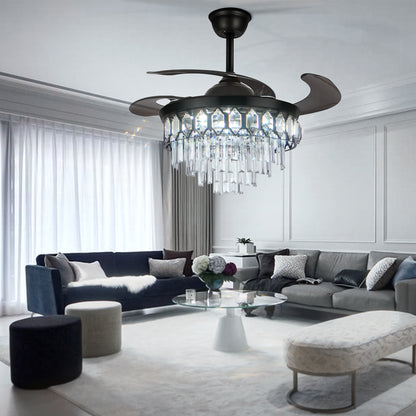 Close-up of the four-tier crystal light and black housing on a retractable ceiling fan.