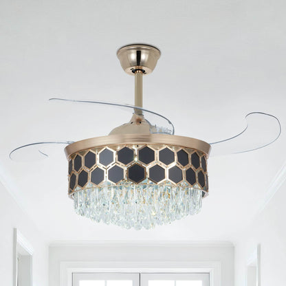 A gold chandelier ceiling fan with four crystal-trimmed tiers and clear retractable blades.