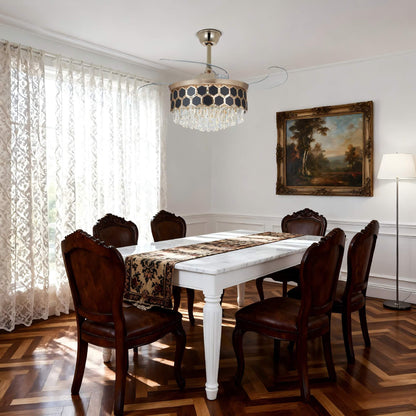 The gold ceiling fan combines transparent blades and a crystal chandelier light.