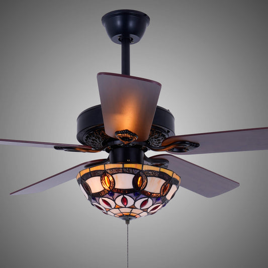 A ceiling fan with five dark brown wooden blades and a decorative stained-glass light fixture below, shown against a plain gray background.